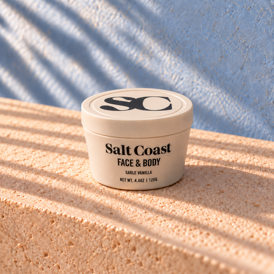 Salt Coast Sable Vanilla grass-fed tallow balm, 125g jar, on sunlit sandstone